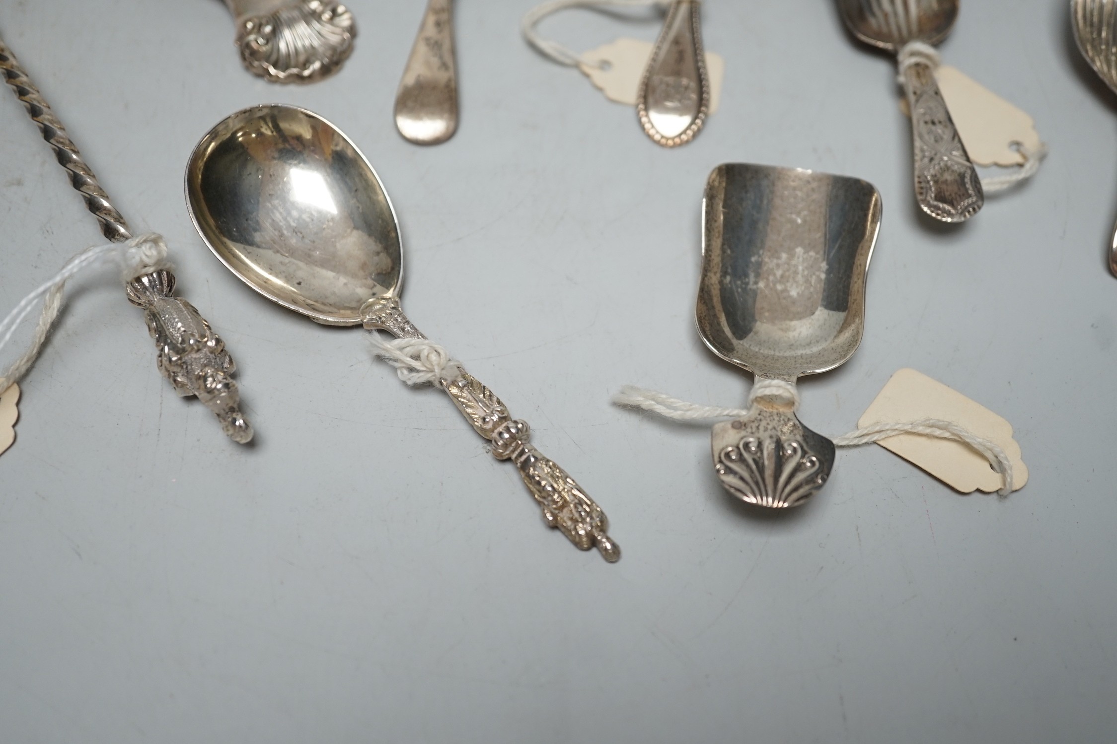 Three assorted 19th century silver caddy spoons, including London, 1829, three 20th century silver caddy spoons and two other silver spoons including Victorian sifter spoon, 14.7cm.